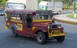 Jeepneys are the most popular means of public transportation in the Philippines. They were originally made from US military jeeps left over from World War II and are known for their flamboyant decoration and crowded seating. They have become a ubiquitous symbol of Philippine culture.